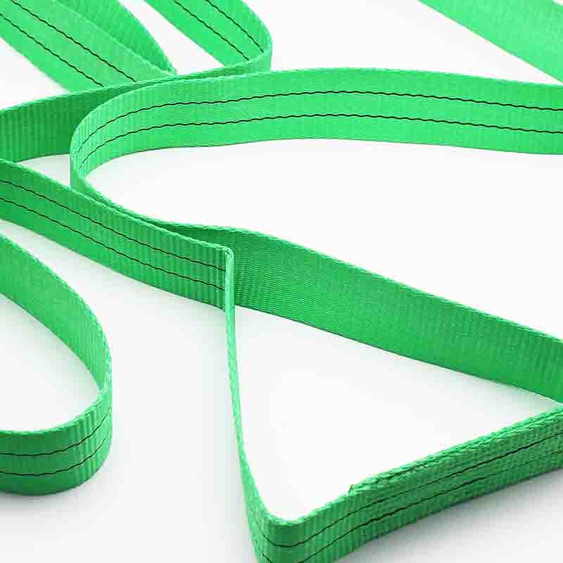 What causes endless type webbing slings to fail more often than rated during vertical lifts